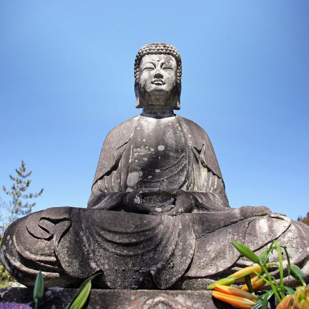@The Japan Times: A large stone-carved Buddha statue at Tenshoji Temple, Takayama. The city is ide…