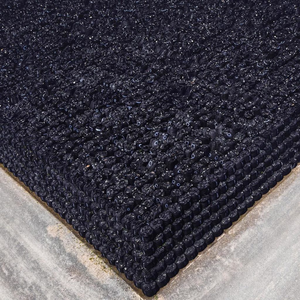 @The Japan Times: Plastic bags filled with radiation-contaminated soil are stacked like pyramids i…