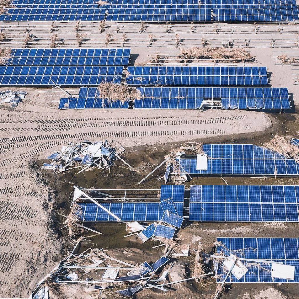 @The Japan Times: Solar panels damaged by a levy collapse in September 2015 are shown along the Ki…