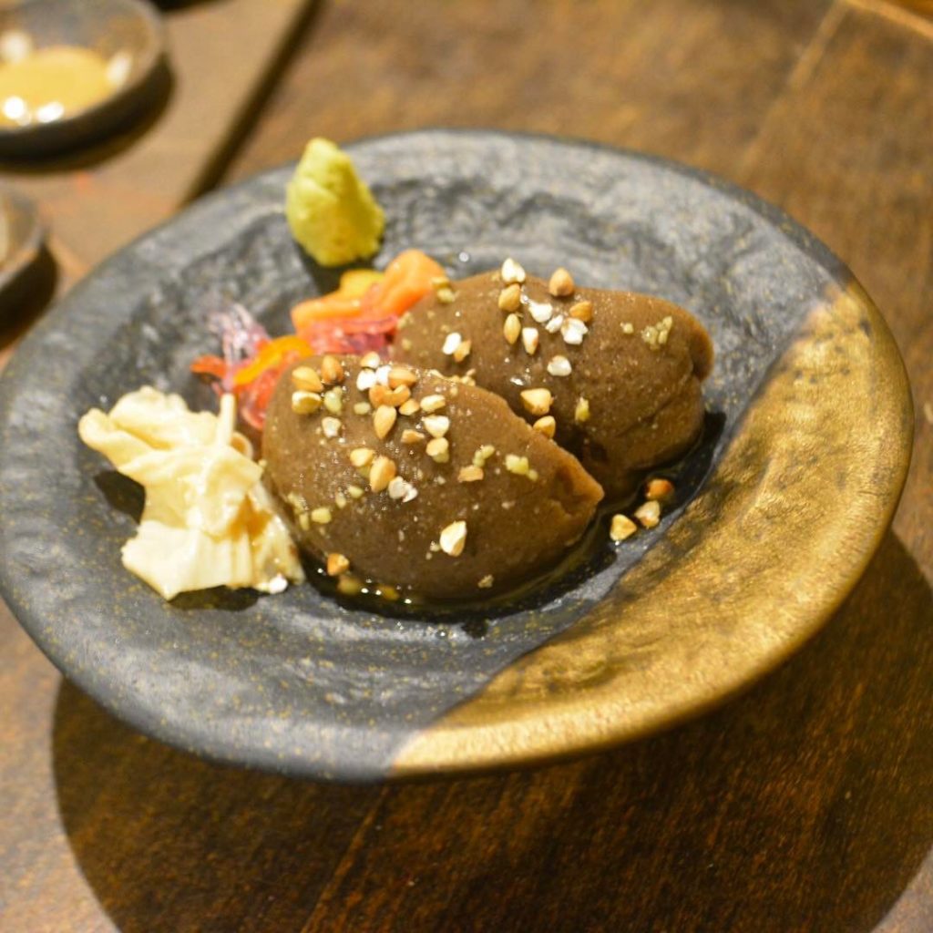 @The Japan Times: Second to none: Tofu made with soba buckwheat and black sesame seeds and topped …