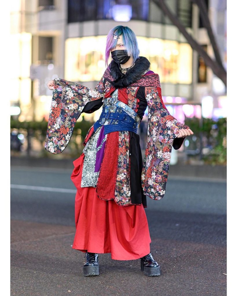 Desuko on the street in Harajuku wearing a colorful kimono from @QutieFrash with...