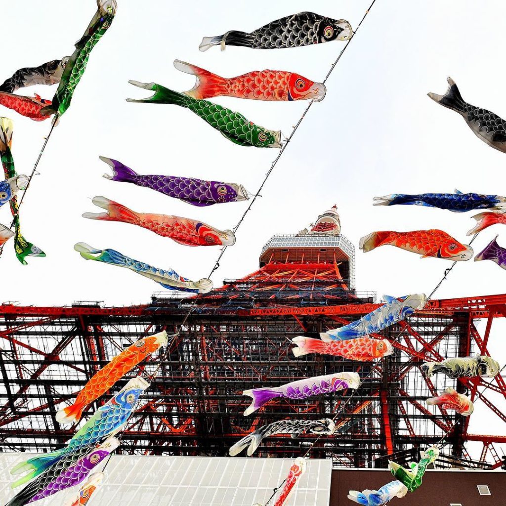 "Koinobori" (carp streamers) fly outside of Tokyo Tower in Minato Ward on April ...