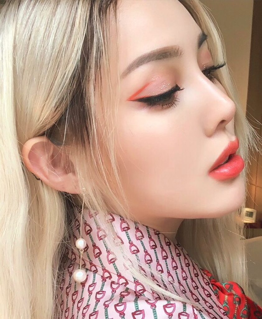 @ponysmakeup creates summer-stained lips with ColorGel Lip Balm in Tiger Lily, a...