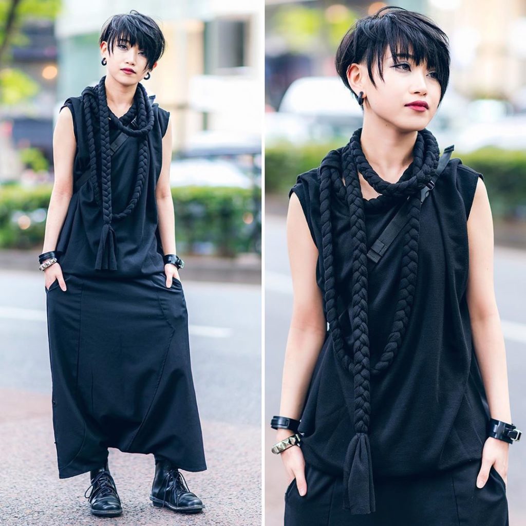 Muon wearing a monochrome style on the street in Harajuku with a rope tassel top...