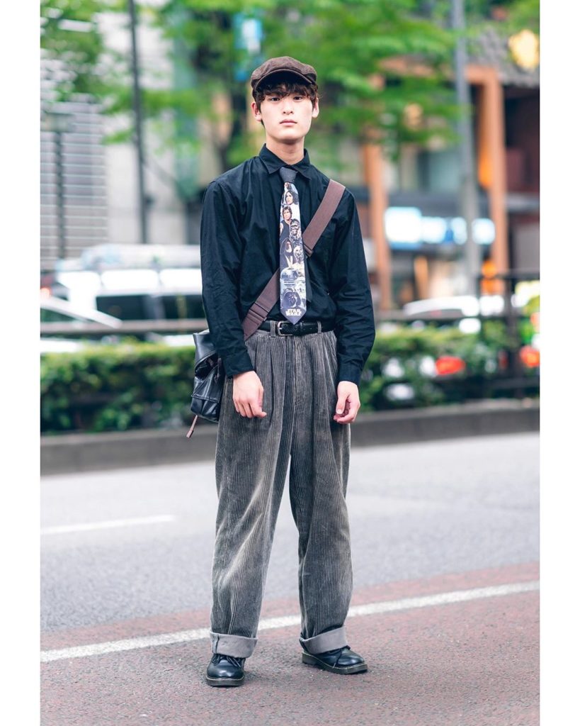 19-year-old Japanese student Asahi wearing a vintage sourced look on the street ...