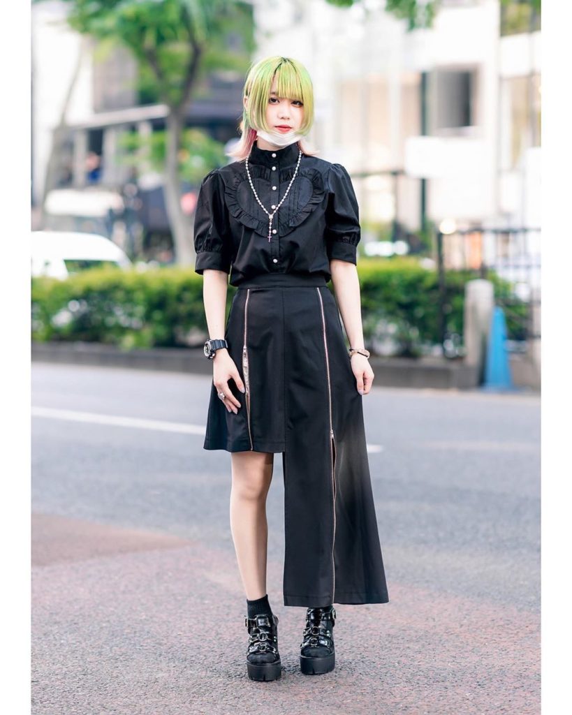 Japanese idol Kinaco on the street in Harajuku wearing a monochrome look with a ...