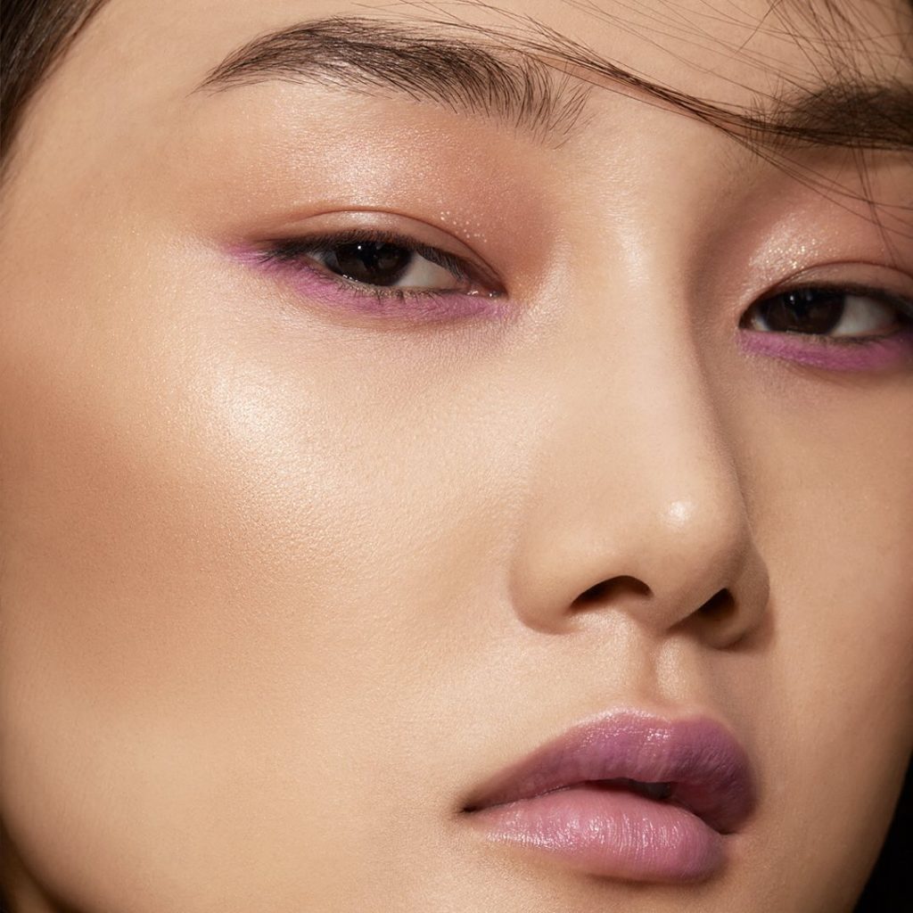 Pair eye-catching liner with lush lilac lips using ColorGel Lip Balm in Wisteria...