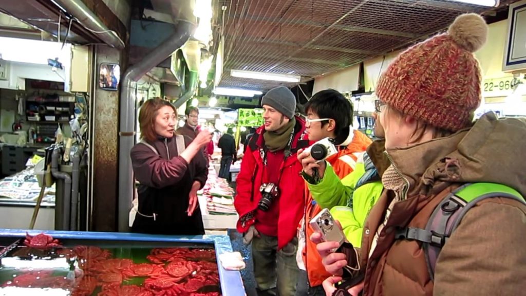 Buying crabs in Otaru seafood market