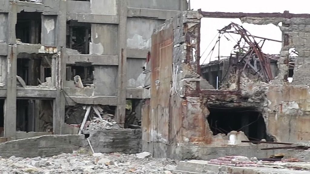 Exploring Abandoned Coal Mining City Island Near Nagasaki Exploring Abandoned Coal Mining City Island Near Nagasaki