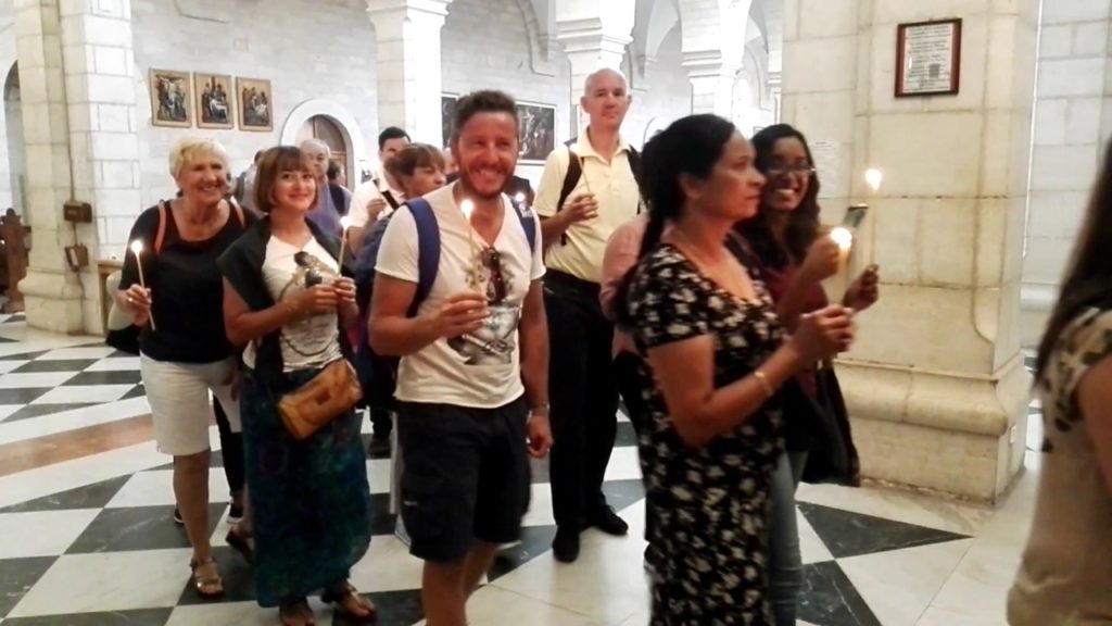 A Catholic procession in the Church of the Nativity, Bethlehem. Tour Guide: Issa Ghanem A Catholic procession in the Church of the Nativity, Bethlehem. Tour Guide: Issa Ghanem
