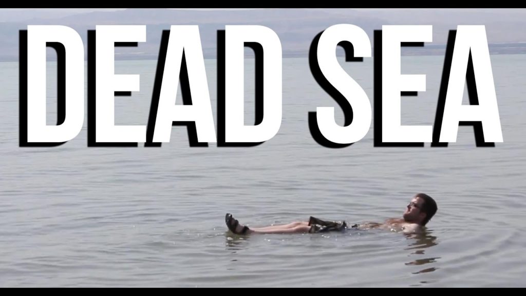 Floating in Dead Sea Jordan tour travel video guide (Shobak Crusader Castle); tourism attractions