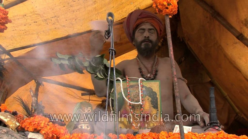 Naga Sadhu meditating at his camp in Juna Akhada during Maha Shivratri