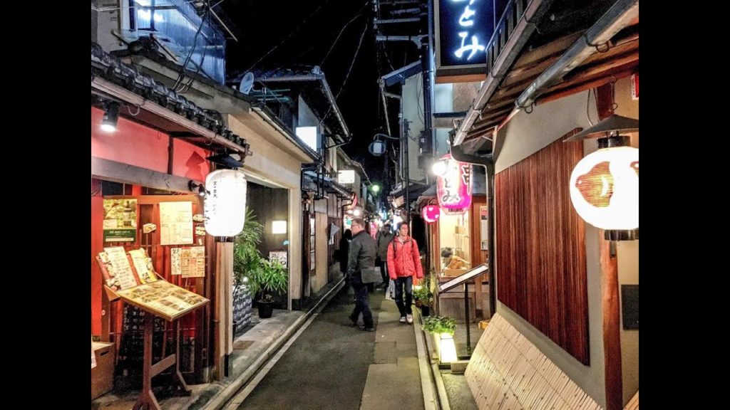 Walking through alleyways of Pontocho, a geisha district in Kyoto, Japan