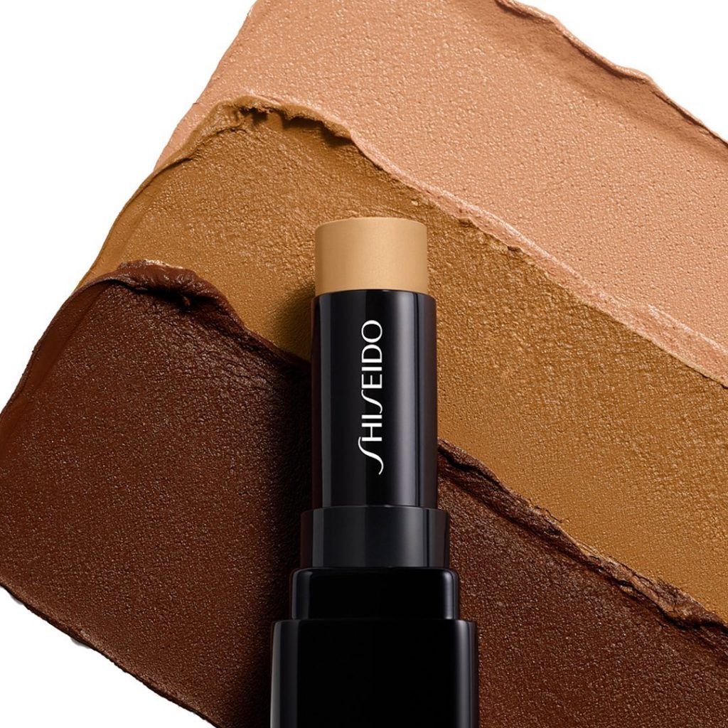 Smooth the Synchro Skin Correcting GelStick Concealer over dark circles and blem...