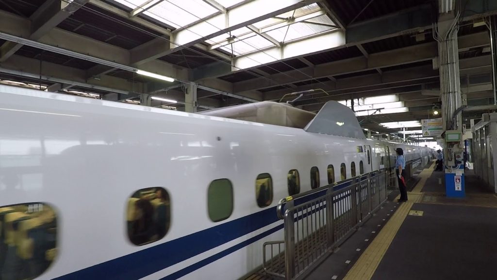Nozomi 35 Shinkansen Bullet train bound to Hakata arriving at Hiroshima station