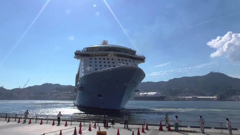 Quantum of the Seas departure from the Nagasaki-port by the giant turn in Japan. Quantum of the Seas departure from the Nagasaki-port by the giant turn in Japan.