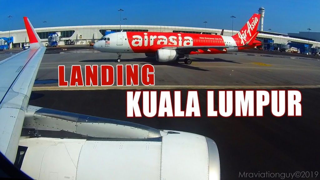 Indonesia AirAsia Airbus A320-216 Approach, Landing, Taxi at Kuala Lumpur Airport (KUL/WMKK)