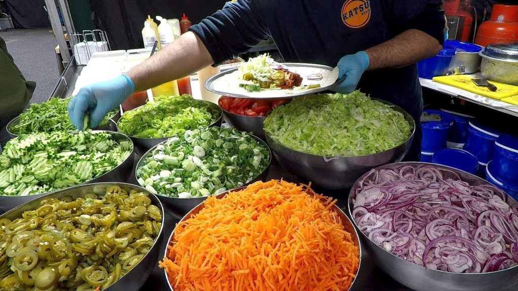 Japanese Katsu Fried Chicken in Wrap. Street Food of London, Broadway Market