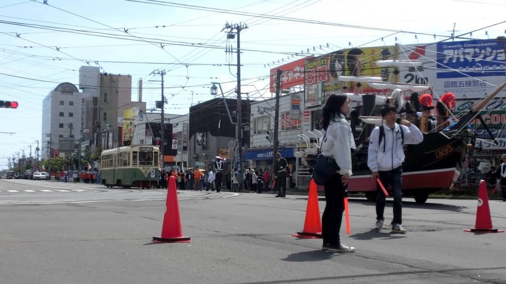 函館市電　Japan Hakodate City Tram ( Street Car ) 812 and 724 along with the parade