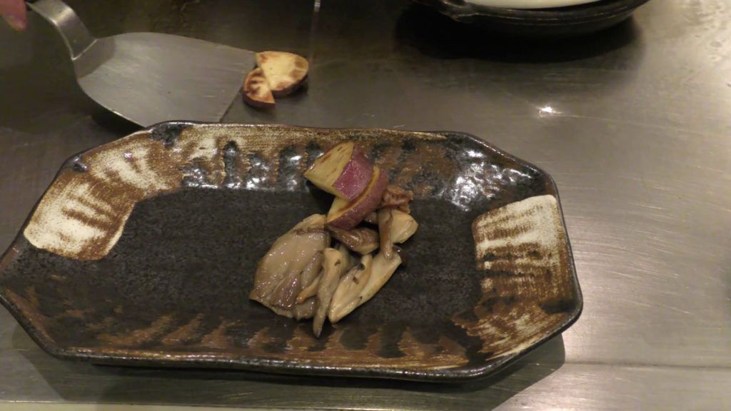 Top chef cooking at Teppanyaki Restaurant Sazanka