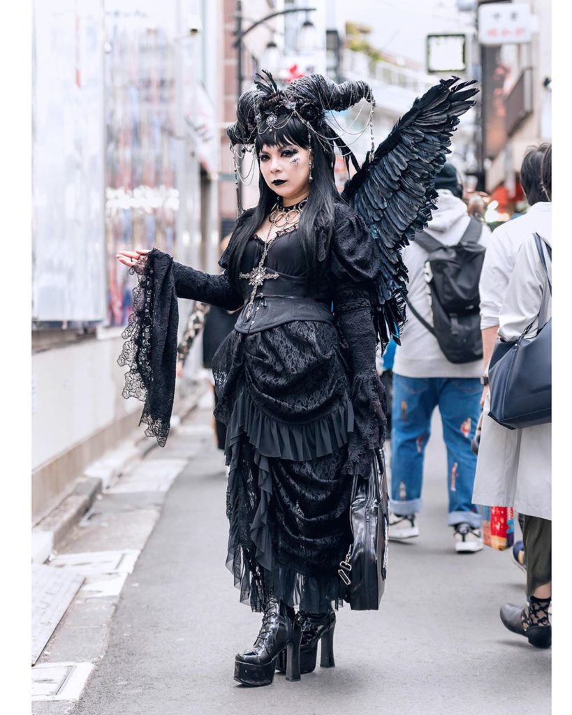 Japanese 3D computer graphics designer Eimmy (@momoneimmy) on the street in Hara...