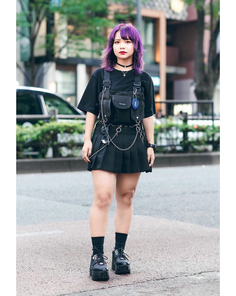 Japanese shop staffer Misaki (@xxpu.01) on the street in Harajuku wearing a Stre...