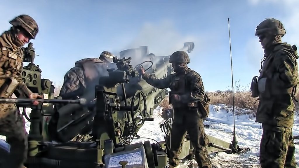Marines Fire Howitzers Under Mt Fuji Japan