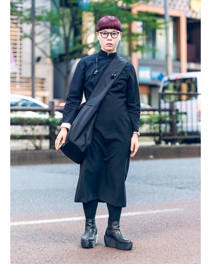 Ruka wearing a monochrome minimalist Japanese street style in Harajuku with a Co...