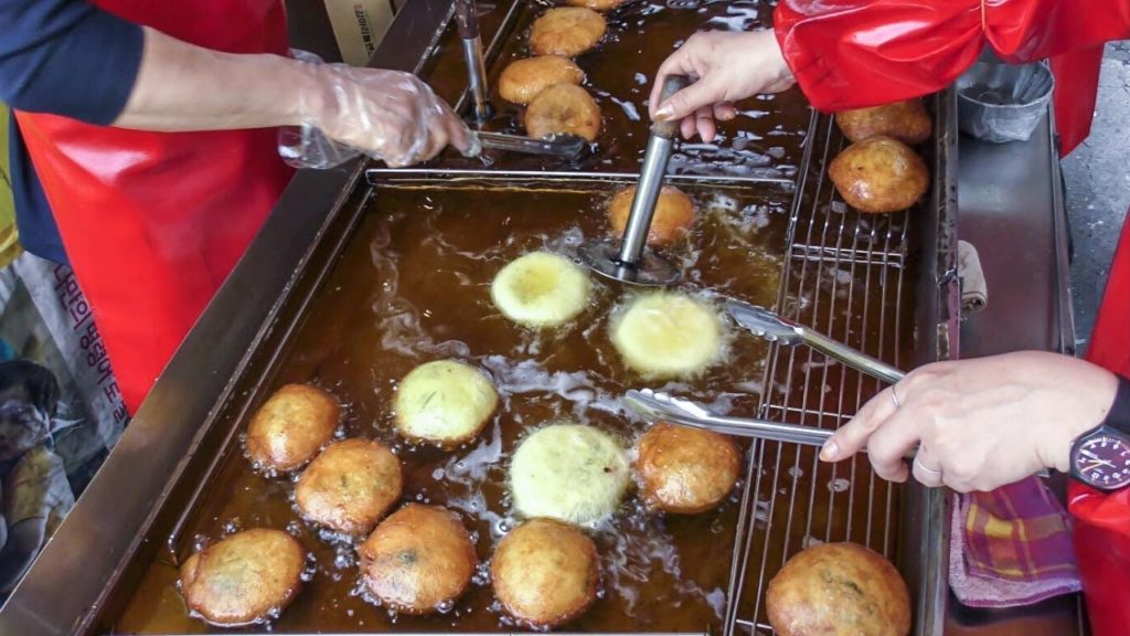 Top Korea Street Food. 'Hotteok' Pancake, Egg Bread, 'Mandu' Dumplings. Namdaemun Market, Seoul