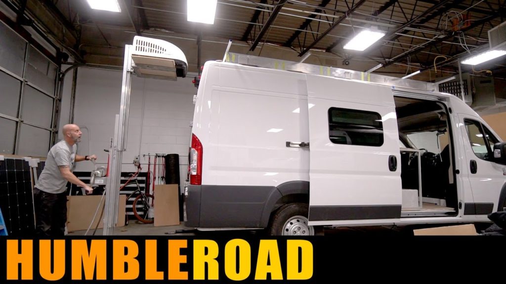 Lifting an air conditioner onto a van roof made easy