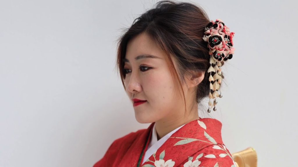 Take a photo at a shrine near the kimono experience on a trip to Hakodate, Hokkaido