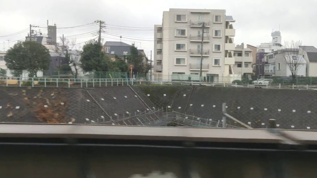 Shinkansen passing JR East Tabata Station