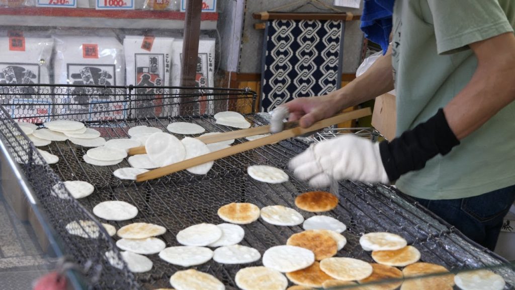 Japanese Street Food. Rice cookie Man in Tokyo Asakusa