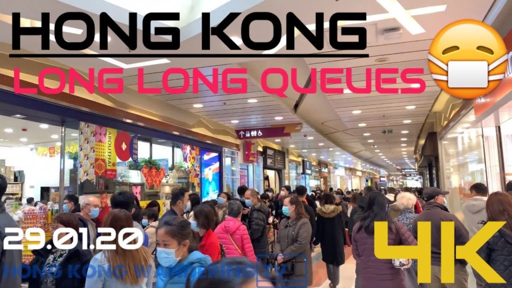 HONG KONG'S LONG QUEUES FOR BUYING MASKS AMID CORONAVIRUS OUTBREAK (4K)