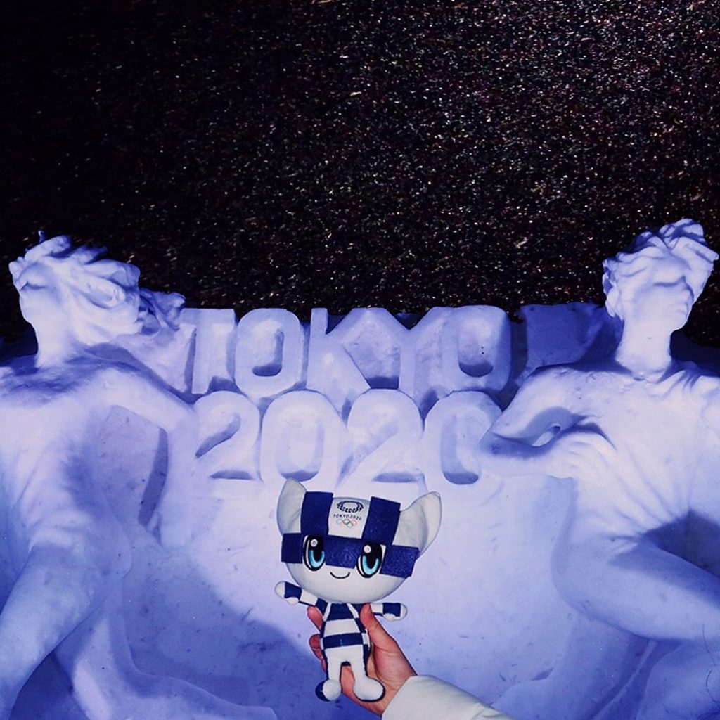 @miraitowa is in Sapporo  Behind #Miraitowa is a sculpture made entirely of snow...