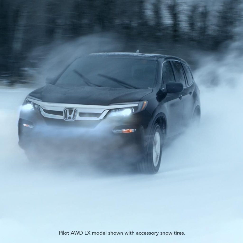 Snow shouldn’t stop your road trips in the #HondaPilot....