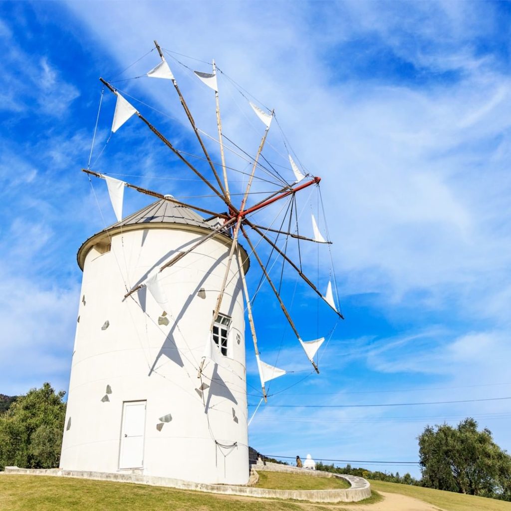 .
A Greek windmill stands in view of the Seto Inland Sea at the Shodoshima Olive...