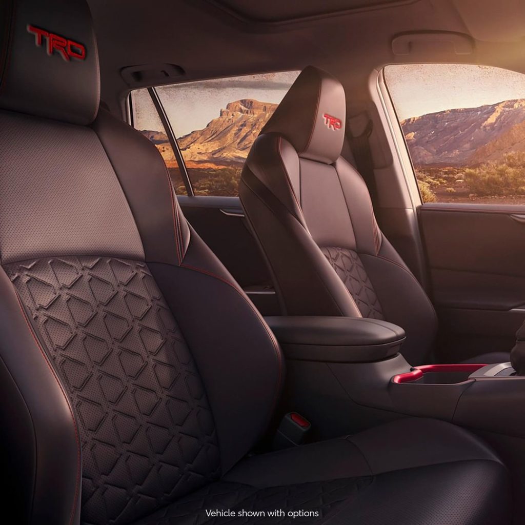 #RAV4 #TRD Off-Road’s sporty exterior continues inside with red accents and SofT...