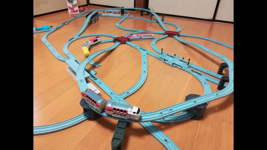 Mini shinkansen travelling across countrysides