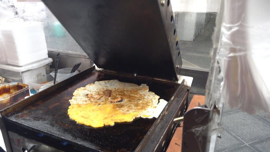 Japanese Street Food – IKAYAKI Grilled squid Osaka-Style Osaka Japan Japanese Street Food - IKAYAKI Grilled squid Osaka-Style Osaka Japan