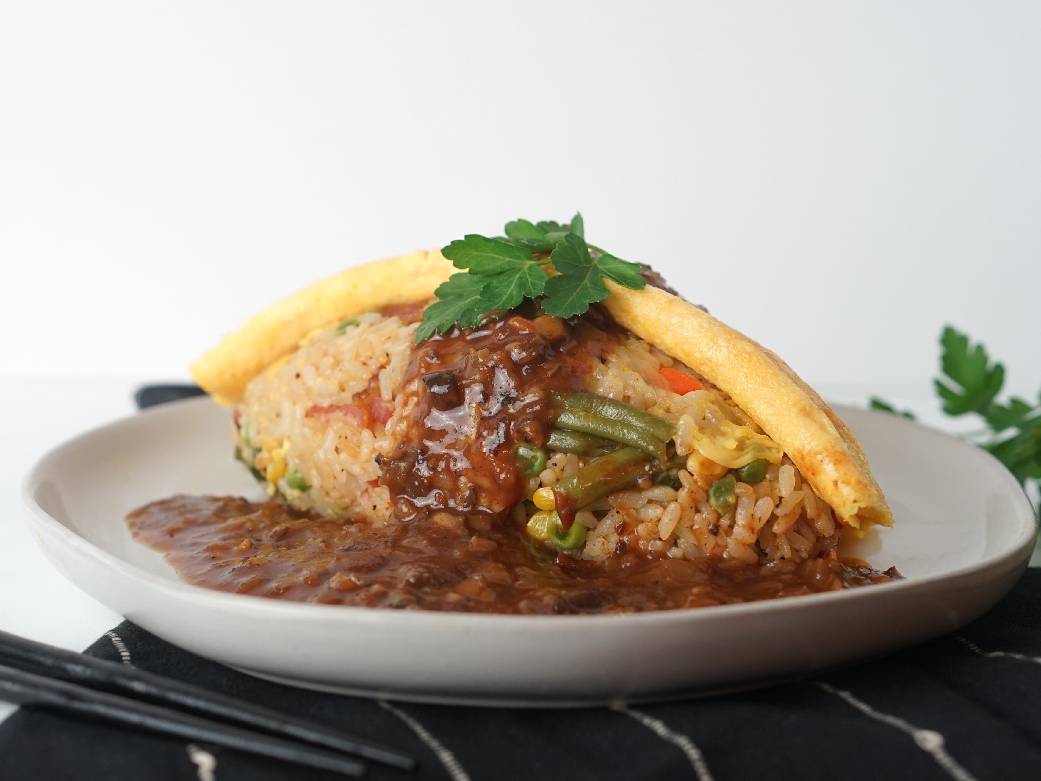 Omurice with homemade mushroom and onion gravy! Alo Japan