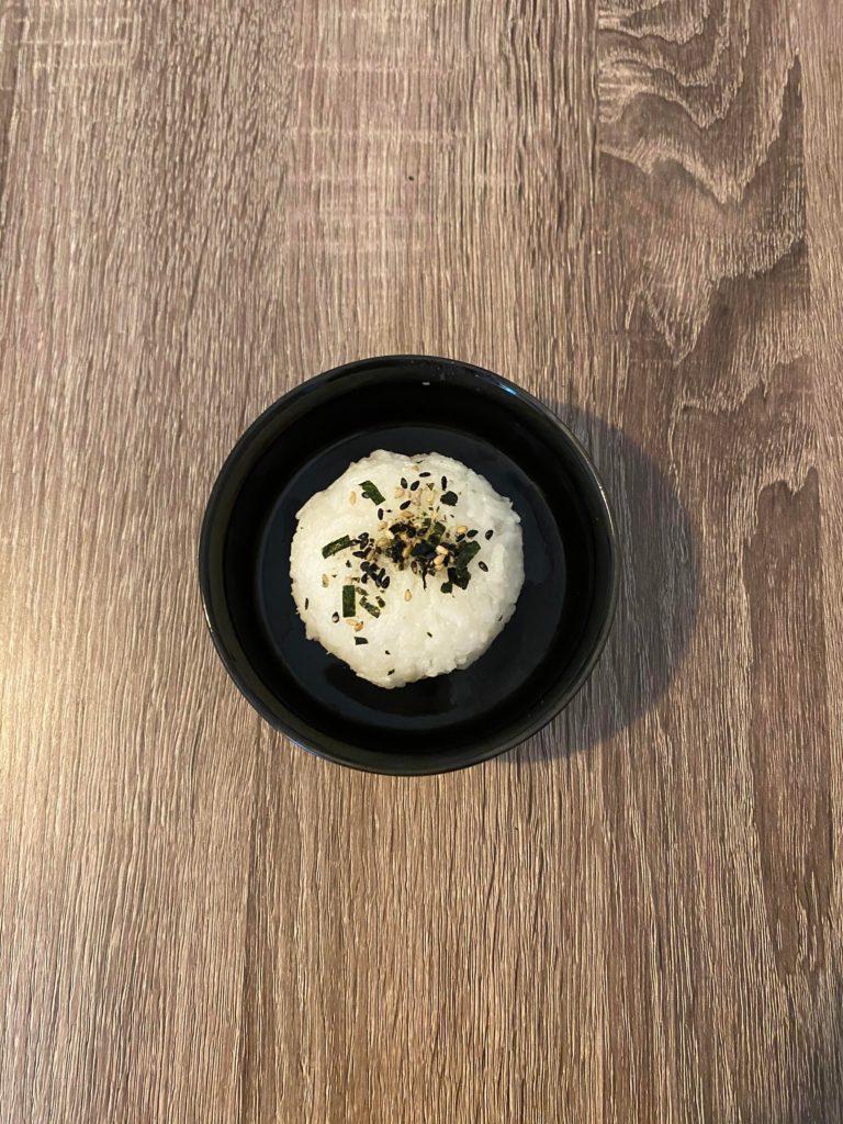 First time making Onigiri. The inside is spicy Salmon and Avocado :D