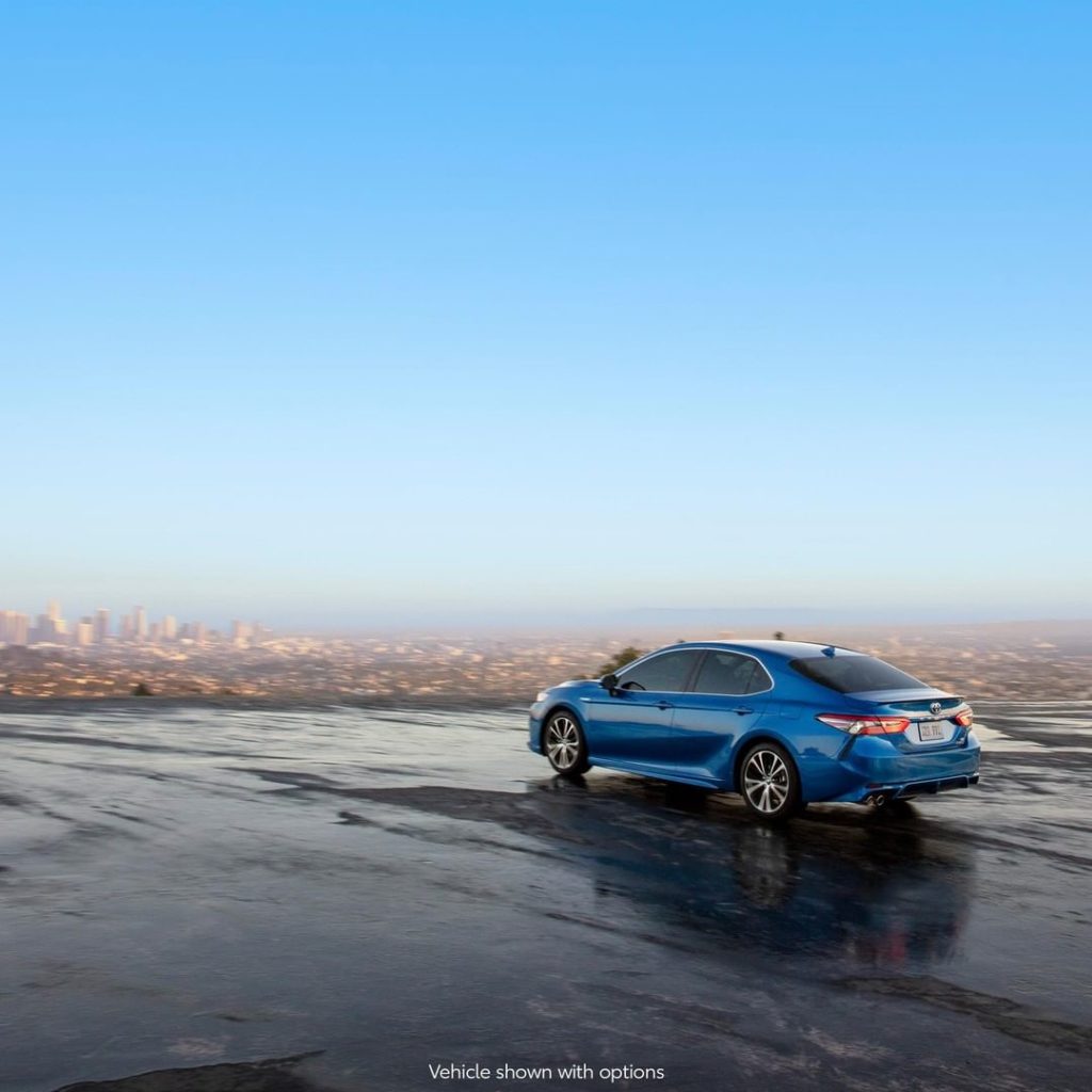 Its striking design goes the extra mile! #Camry #Hybrid #LetsGoPlaces...