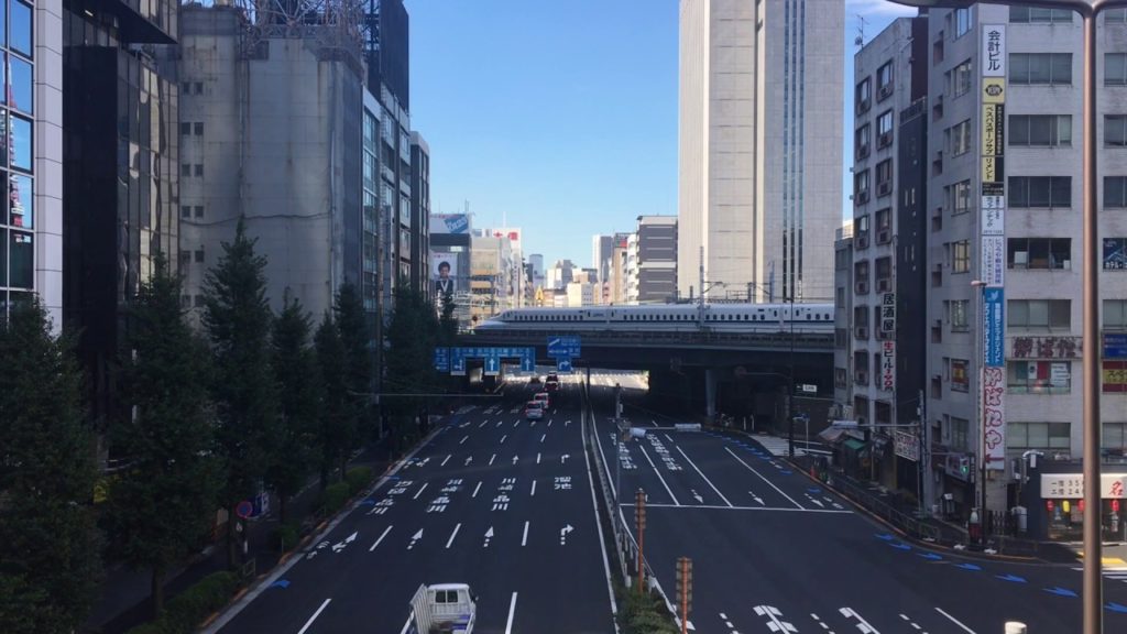 Shinkansen (N700 Series) Cutting Through Tokyo Japan