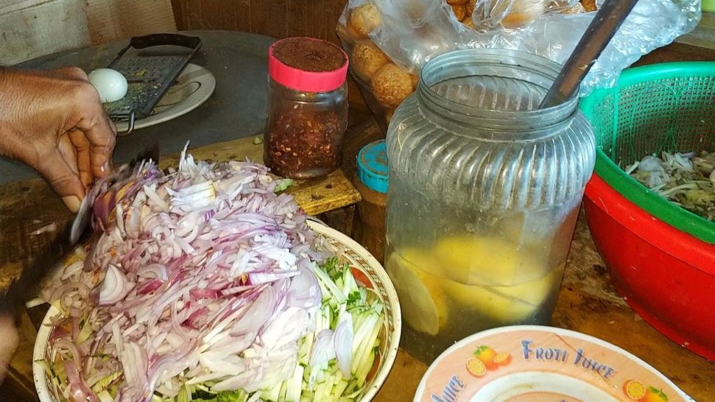 Hard working man Grind The Onion Onion Cutting Popular Street Food Cox's Bazar