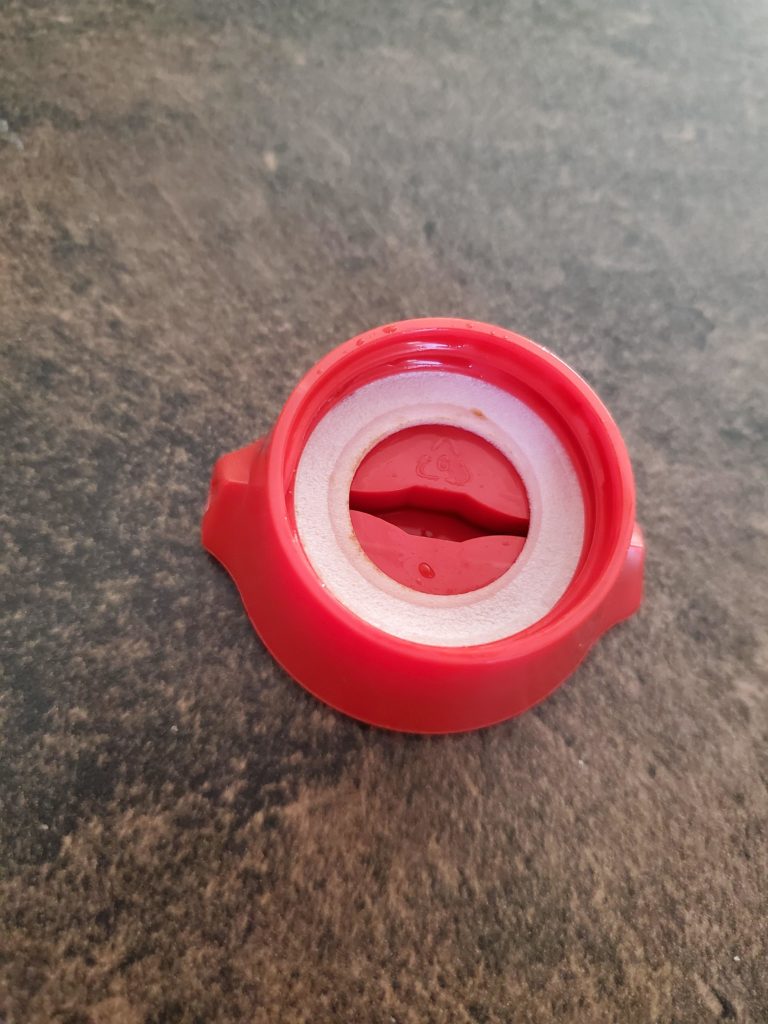 I bought my first Kikkoman bottle earlier today. When opening it I noticed this styrofoam ring in the cap. Do I need to keep it or remove it? Sorry for the dumb question, just wanna make sure.