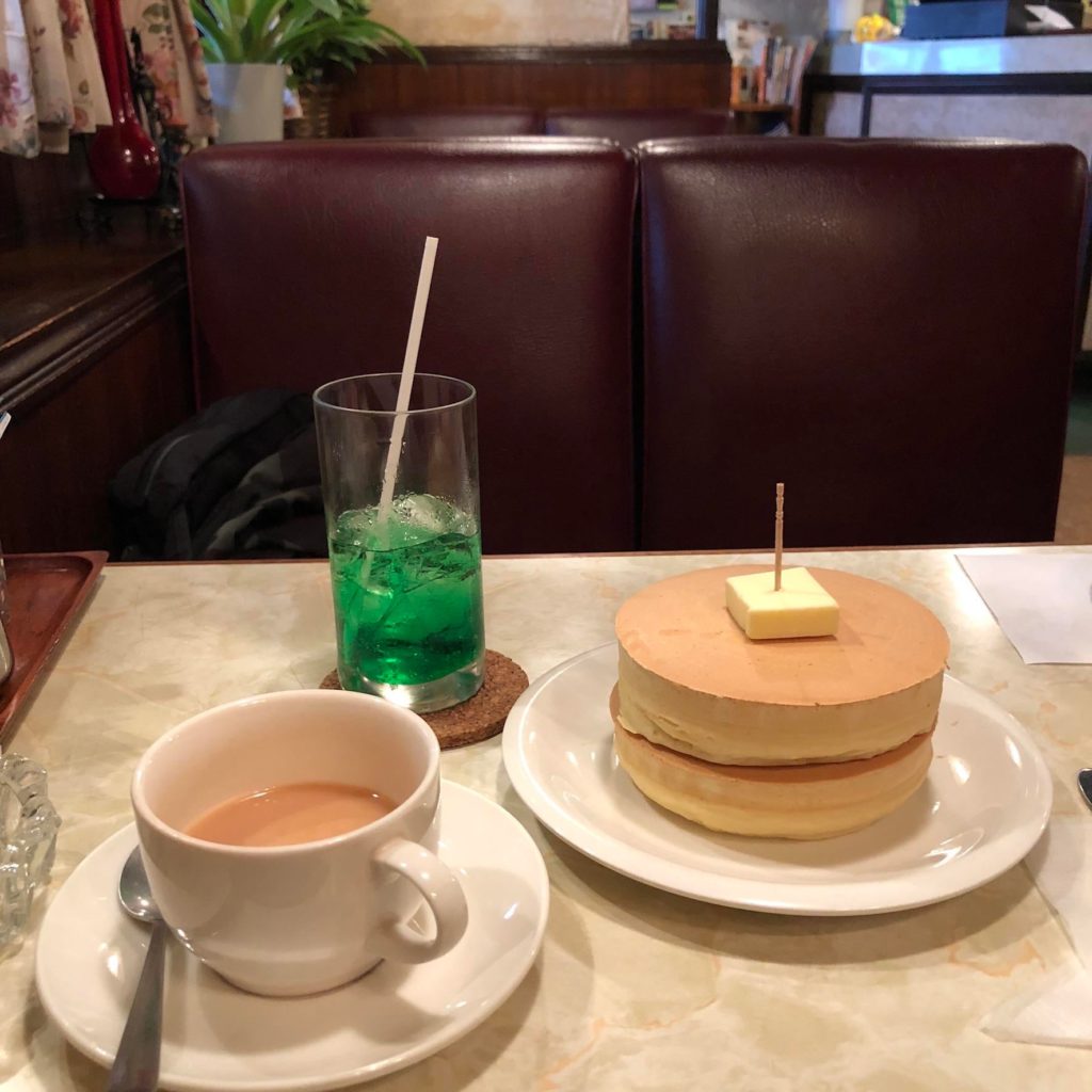 Adorable retro kissaten we found my first trip to Japan! Pancakes, melon soda, and royal milk tea!