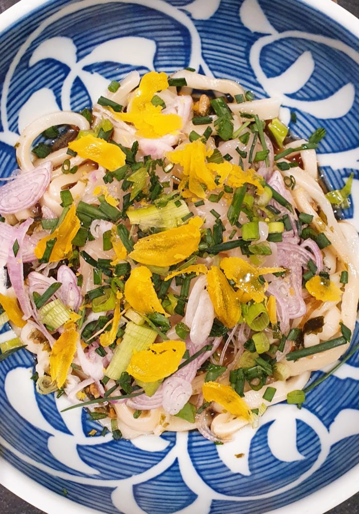 Homemade udon, scallops sashimi, salt cured eggs, shallots, fish bone reduction and lots of green onions & chives !