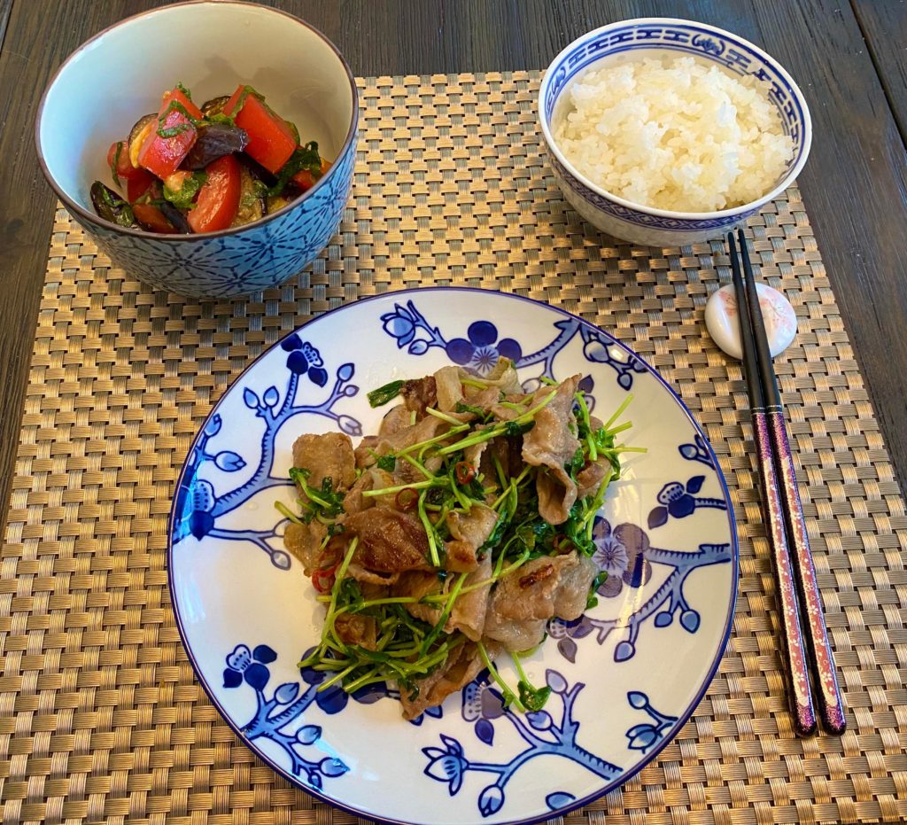 Pork usugiri with pea sprouts and an eggplant tomato salad.