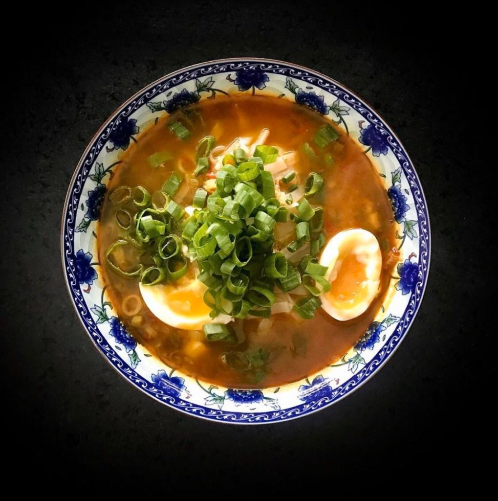 Noodle soup & eggs with chopped chives